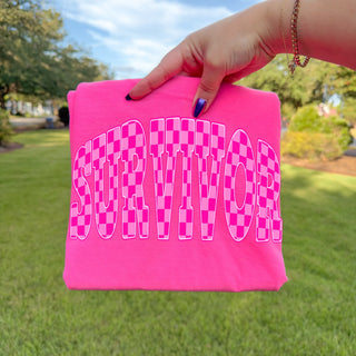 Pink checkered breast cancer survivor