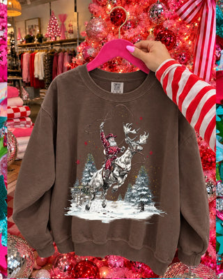 Roping reindeer Santa