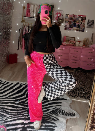 The double trouble Pink zebra and black and white checkered pants rts