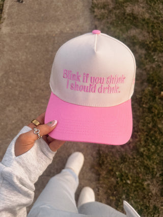 Blink if you think I should drink trucker hat
